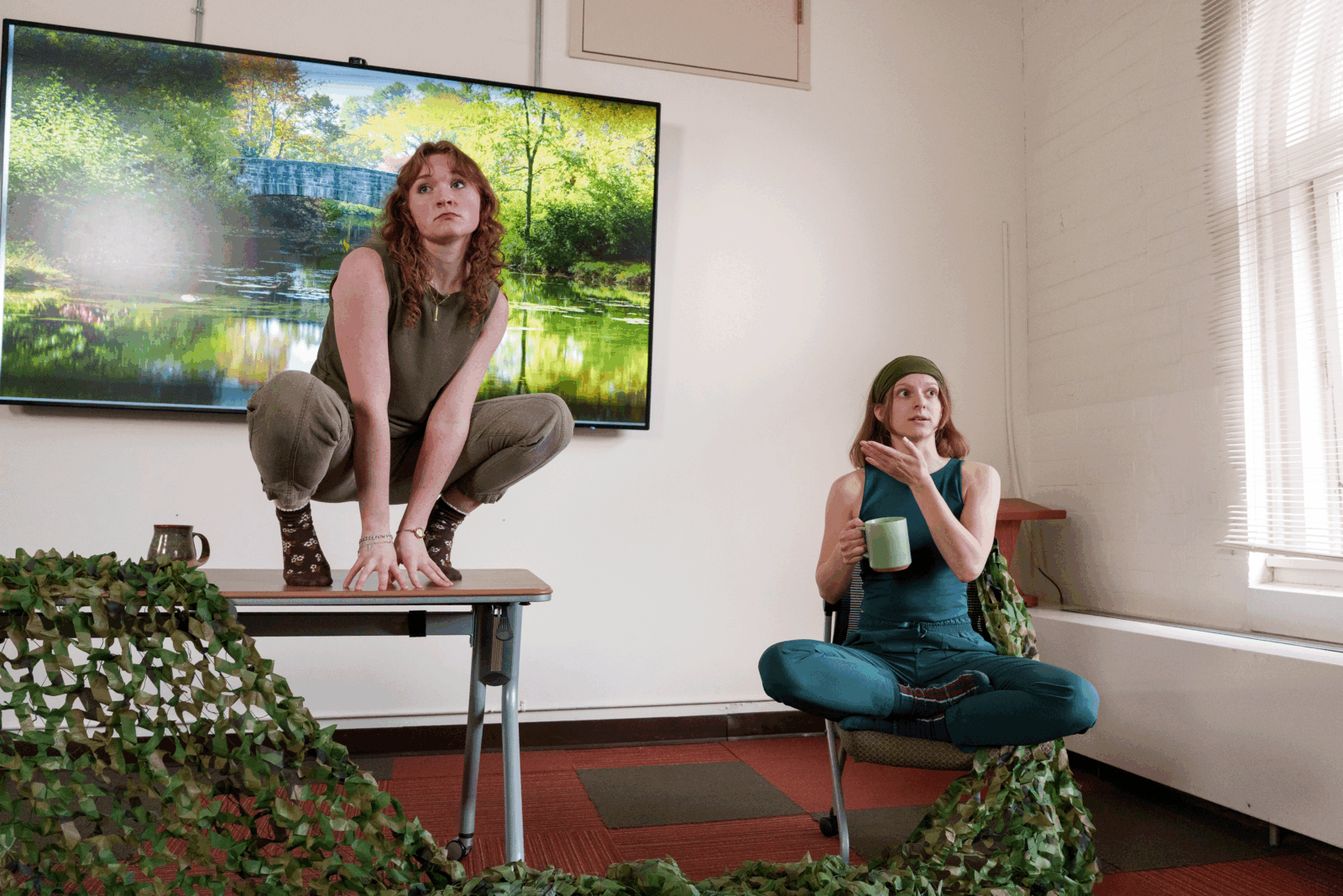 students performing as frogs